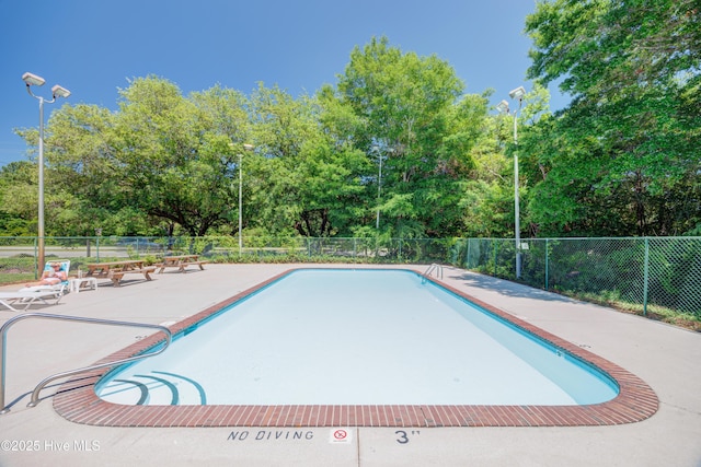 2726 S 17th St Unit C, Wilmington, NC 28412 - community pool featuring view of wooded area and a patio