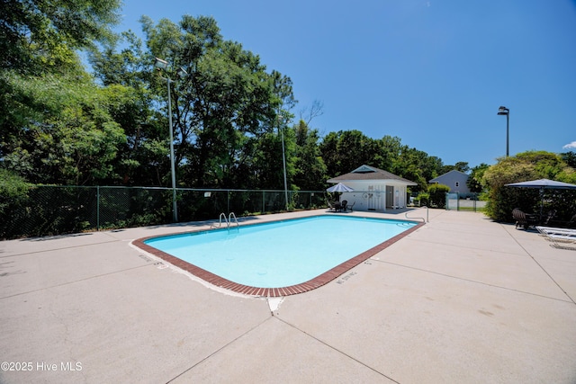 2726 S 17th St Unit C, Wilmington, NC 28412 - community pool with a patio area and view of wooded area