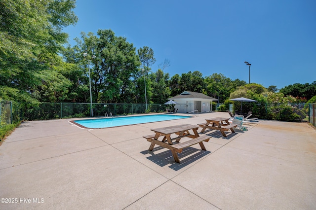 2726 S 17th St Unit C, Wilmington, NC 28412 - view of swimming pool with a patio and view of scattered trees