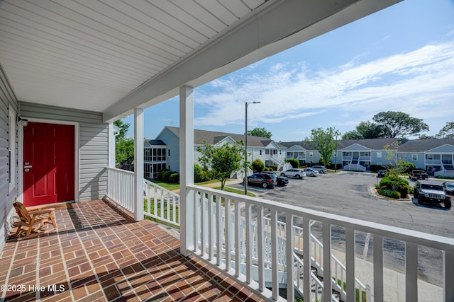 2726 S 17th St Unit C, Wilmington, NC 28412 - covered porch featuring a residential view