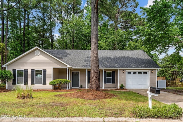 ranch-style house with an attached garage, concrete driveway, and roof with shingles