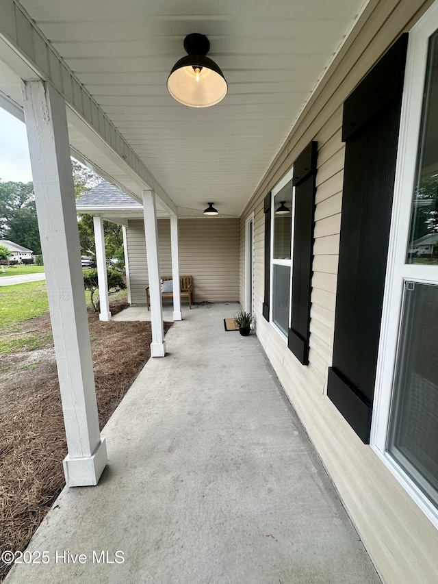 view of patio / terrace featuring ceiling fan