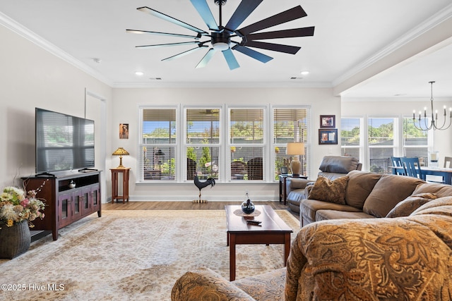 113 Eagle Claw Dr, Calabash, NC 28467 - living area with a chandelier, ceiling fan, wood finished floors, recessed lighting, and crown molding