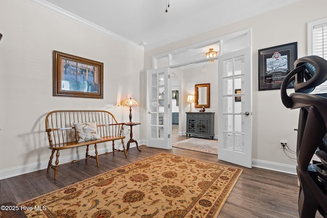 113 Eagle Claw Dr, Calabash, NC 28467 - living area featuring french doors, crown molding, dark wood-type flooring, and baseboards