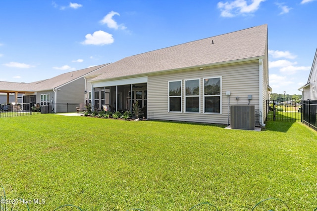 113 Eagle Claw Dr, Calabash, NC 28467 - rear view of house with central air condition unit and a sunroom