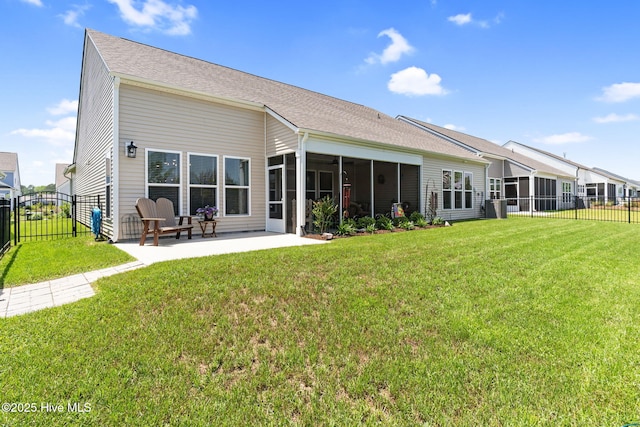 113 Eagle Claw Dr, Calabash, NC 28467 - rear view of property featuring a sunroom and a patio