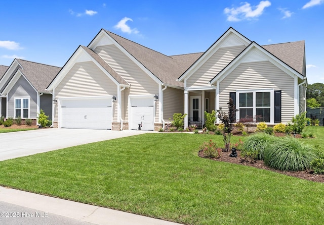 113 Eagle Claw Dr, Calabash, NC 28467 - view of front facade with a garage, driveway, a front lawn, and a shingled roof