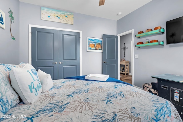 bedroom featuring a closet and a ceiling fan