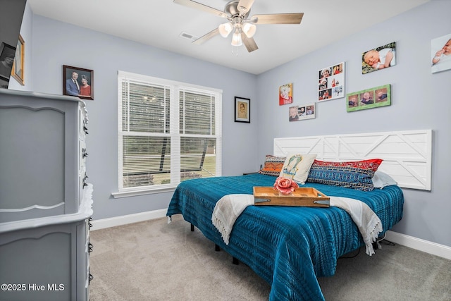 bedroom featuring carpet floors, baseboards, and ceiling fan