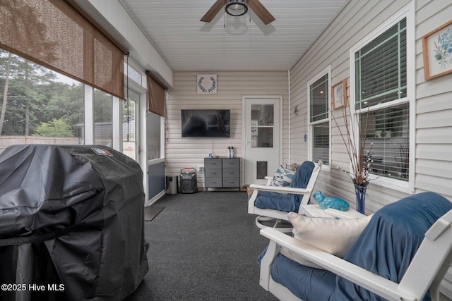 sunroom / solarium with ceiling fan