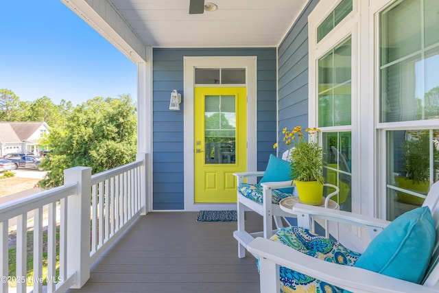 201 W Yacht Dr, Oak Island, NC 28465 - wooden terrace featuring a porch