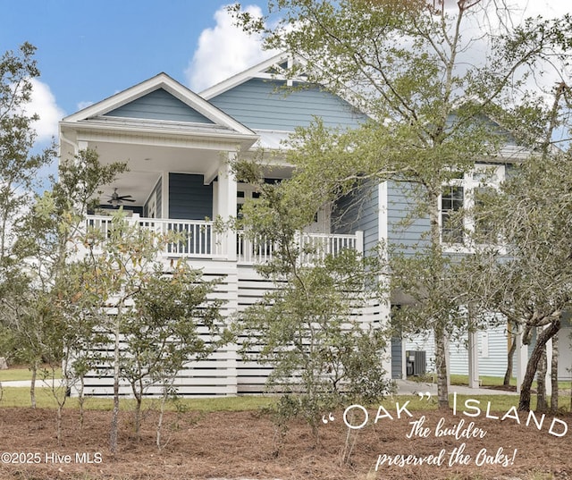 201 W Yacht Dr, Oak Island, NC 28465 - view of front of house featuring covered porch