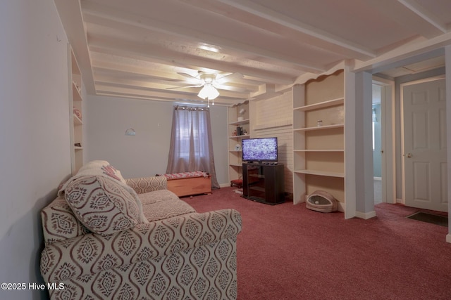 178 Stanley St, West End, NC 27376 - carpeted living area with beamed ceiling, built in shelves, and ceiling fan