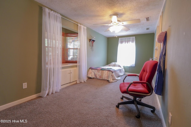 178 Stanley St, West End, NC 27376 - bedroom featuring a textured ceiling, carpet flooring, a ceiling fan, and baseboards