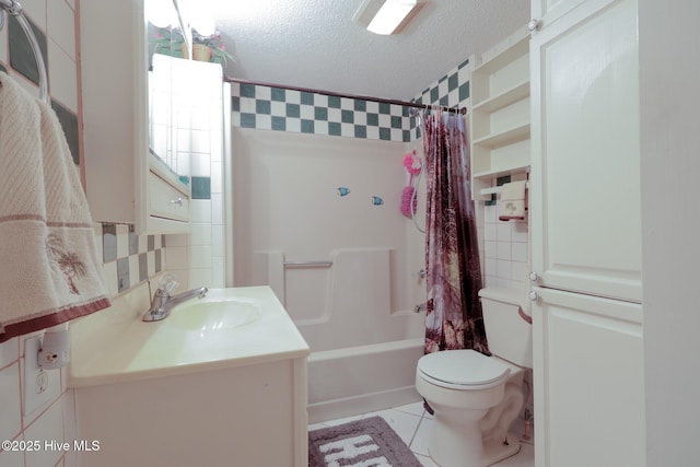 178 Stanley St, West End, NC 27376 - full bath with toilet, shower / tub combo, a textured ceiling, vanity, and tile patterned flooring