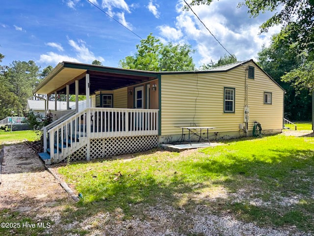 178 Stanley St, West End, NC 27376 - view of front of property featuring covered porch and a front yard