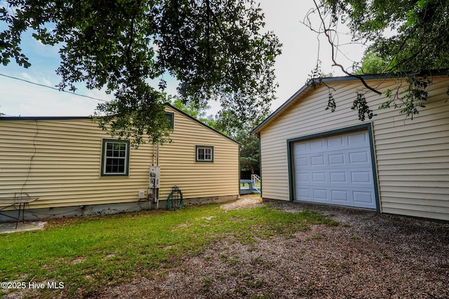178 Stanley St, West End, NC 27376 - detached garage featuring driveway
