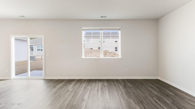 2304 Emerald Ave Lot 272, Castle Hayne, NC 28429 - empty room featuring dark wood-type flooring and baseboards