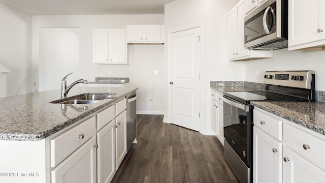 2304 Emerald Ave Lot 272, Castle Hayne, NC 28429 - kitchen featuring appliances with stainless steel finishes, a sink, white cabinetry, and stone countertops