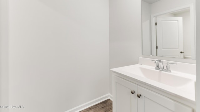 2304 Emerald Ave Lot 272, Castle Hayne, NC 28429 - bathroom with wood finished floors, vanity, and baseboards