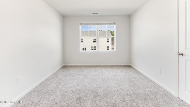 2304 Emerald Ave Lot 272, Castle Hayne, NC 28429 - spare room with carpet floors and baseboards