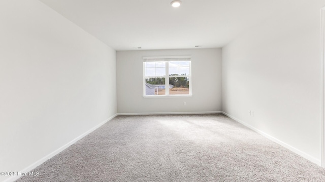 2304 Emerald Ave Lot 272, Castle Hayne, NC 28429 - carpeted empty room with baseboards