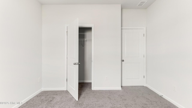 2304 Emerald Ave Lot 272, Castle Hayne, NC 28429 - unfurnished bedroom with carpet floors, baseboards, and a closet