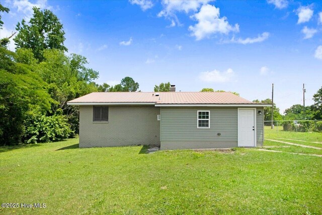 406 Mercer St, Goldsboro, NC 27530 - rear view of property featuring metal roof