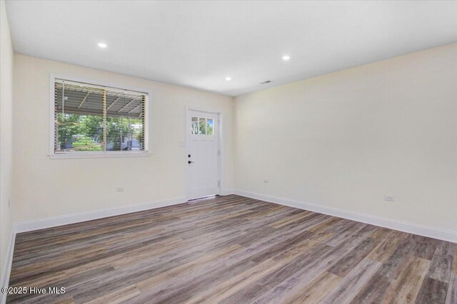 406 Mercer St, Goldsboro, NC 27530 - unfurnished room featuring wood finished floors, baseboards, and recessed lighting