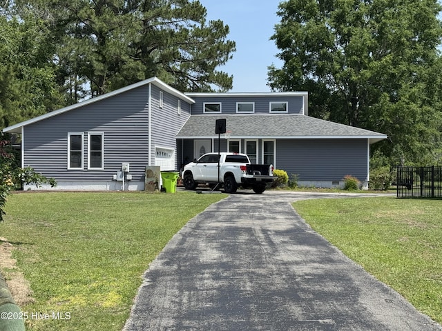 107 Knottline Rd, New Bern, NC 28562 - mid-century home with a front lawn, driveway, a shingled roof, and crawl space