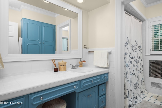 2008 S Elm St, Greenville, NC 27858 - bathroom with vanity, crown molding, a shower with shower curtain, tile walls, and recessed lighting