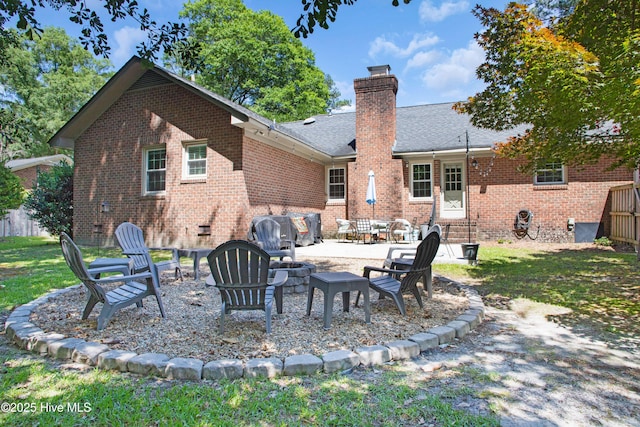 2008 S Elm St, Greenville, NC 27858 - rear view of property with brick siding, a chimney, a patio, entry steps, and a shingled roof