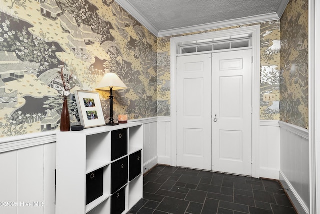 2008 S Elm St, Greenville, NC 27858 - foyer entrance with wallpapered walls, wainscoting, a textured ceiling, and ornamental molding