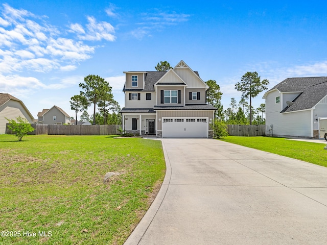 118 Prospect Dr, Richlands, NC 28574 - view of front of home with board and batten siding, stone siding, concrete driveway, an attached garage, and a porch