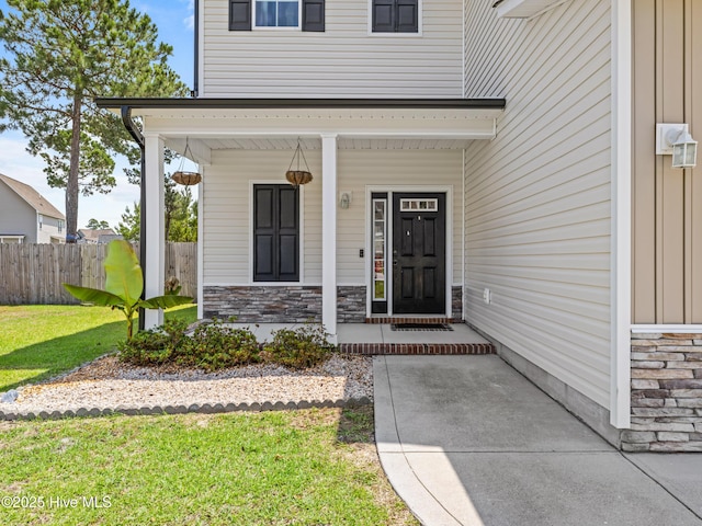 118 Prospect Dr, Richlands, NC 28574 - view of exterior entry featuring stone siding and covered porch