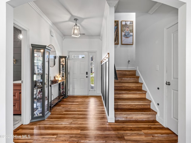 118 Prospect Dr, Richlands, NC 28574 - foyer featuring wood finished floors, stairs, and crown molding