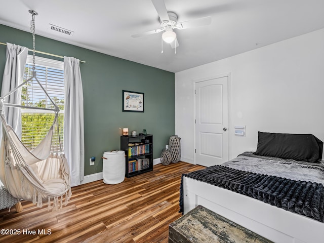 118 Prospect Dr, Richlands, NC 28574 - bedroom with wood finished floors, baseboards, and ceiling fan