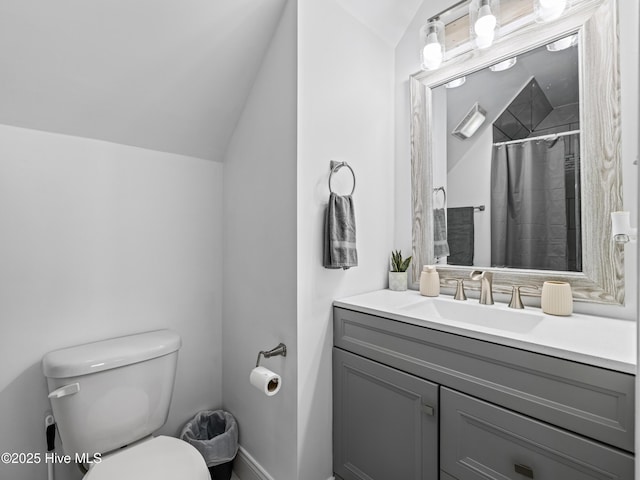 118 Prospect Dr, Richlands, NC 28574 - full bath with vaulted ceiling, toilet, vanity, baseboards, and a shower with shower curtain