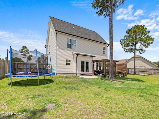 118 Prospect Dr, Richlands, NC 28574 - back of house with a trampoline and a patio area