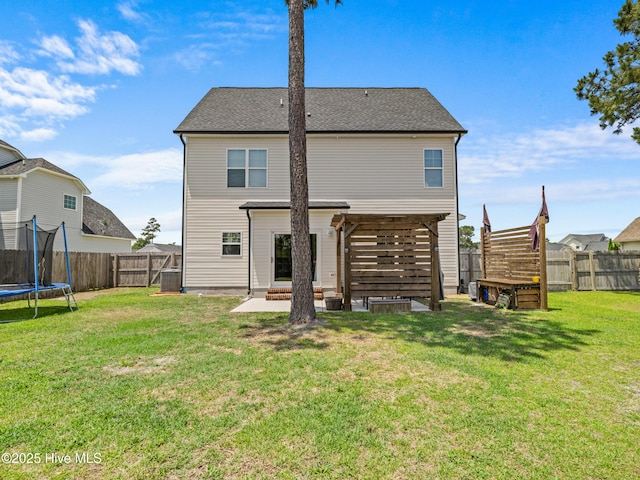 118 Prospect Dr, Richlands, NC 28574 - back of property with a trampoline and a patio area