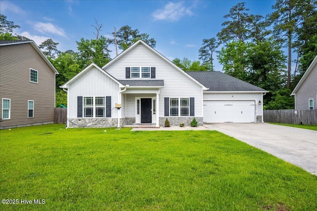 222 Station House Rd, New Bern, NC 28562 - traditional home featuring stone siding, concrete driveway, board and batten siding, and a garage