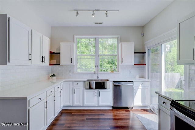 222 Station House Rd, New Bern, NC 28562 - kitchen featuring open shelves, stainless steel appliances, a sink, and white cabinets