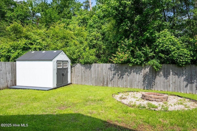 222 Station House Rd, New Bern, NC 28562 - view of yard featuring an outdoor fire pit, an outbuilding, and a storage unit