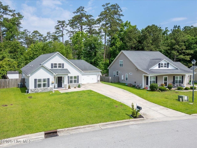 222 Station House Rd, New Bern, NC 28562 - traditional-style house featuring concrete driveway, covered porch, and board and batten siding