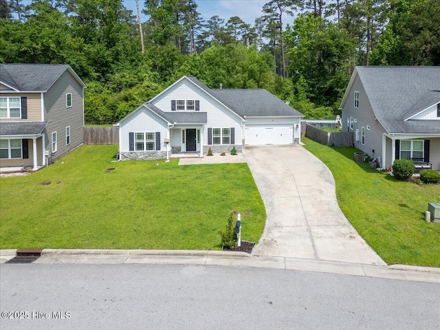 222 Station House Rd, New Bern, NC 28562 - traditional home with concrete driveway, covered porch, and a garage