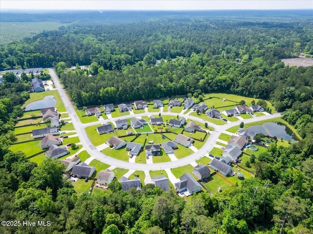 222 Station House Rd, New Bern, NC 28562 - aerial view of property and surrounding area with a heavily wooded area and nearby suburban area
