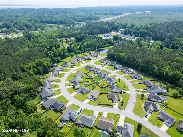 222 Station House Rd, New Bern, NC 28562 - aerial view of property's location featuring a heavily wooded area and nearby suburban area