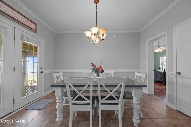 859 Old Pamlico Beach Rd W, Belhaven, NC 27810 - tiled dining room featuring plenty of natural light, crown molding, and a chandelier