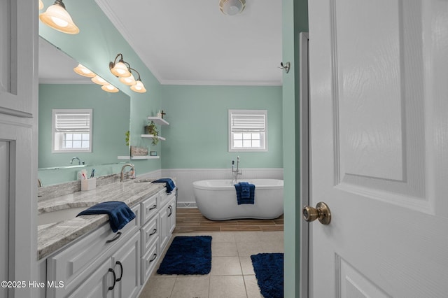 859 Old Pamlico Beach Rd W, Belhaven, NC 27810 - full bathroom with crown molding, plenty of natural light, a freestanding bath, double vanity, and tile patterned flooring