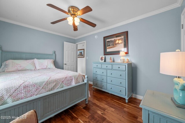 859 Old Pamlico Beach Rd W, Belhaven, NC 27810 - bedroom featuring baseboards, crown molding, dark wood-type flooring, and a ceiling fan